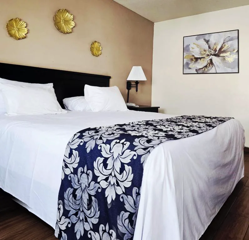 Comfortable guest room at Hotel Express Inn
